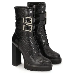 Botas de tacón alto con caña alta.Este producto tallaje pequeño.