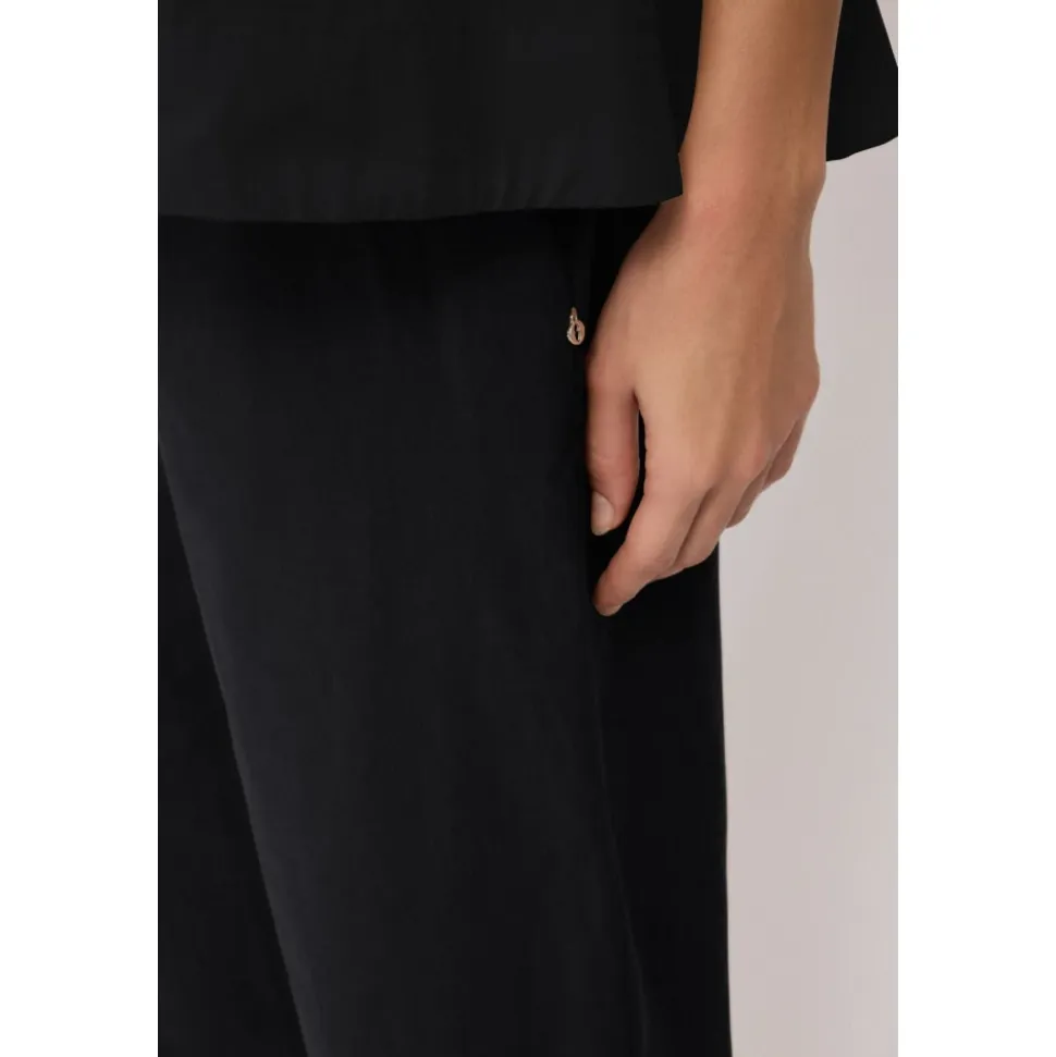 Pantalones Anchos