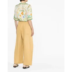 Pantalones anchos de lino amarillo de talle alto