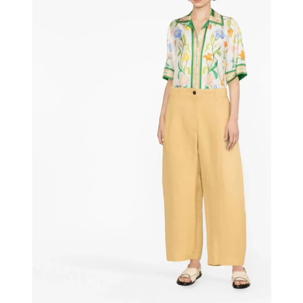 Pantalones anchos de lino amarillo de talle alto