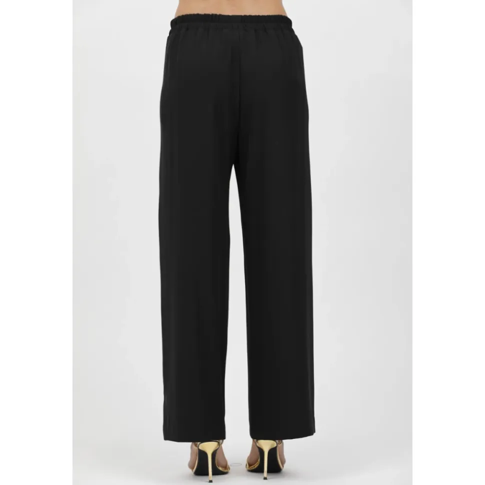 Pantalones fluidos de cady elástico