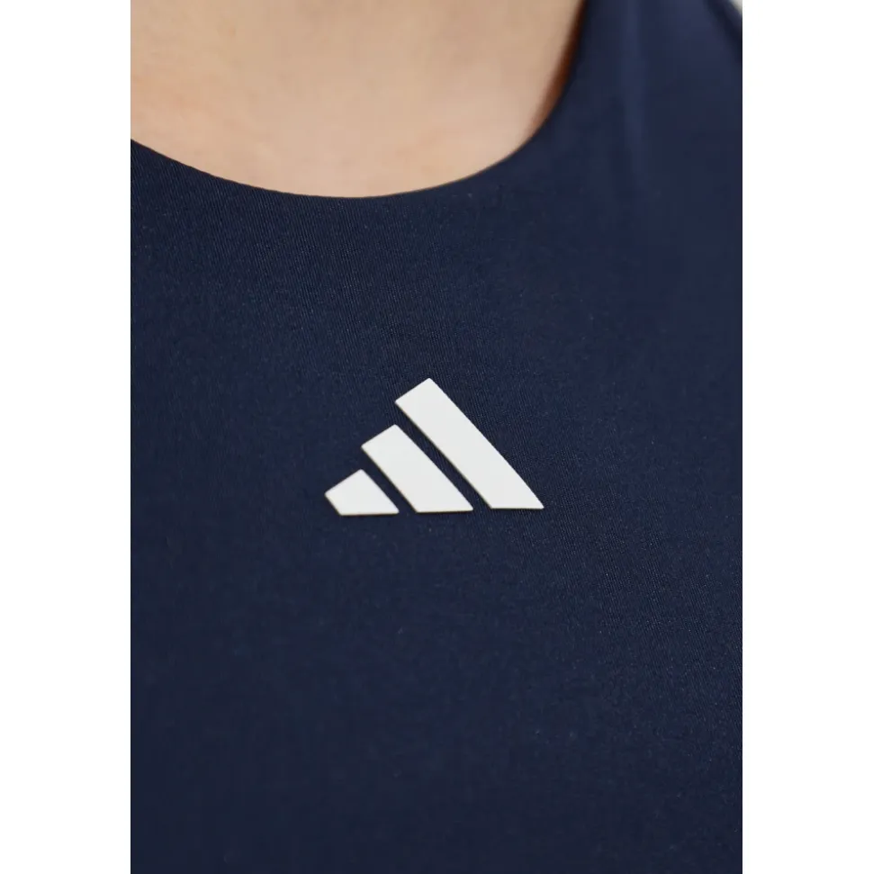 Top con logo estampado